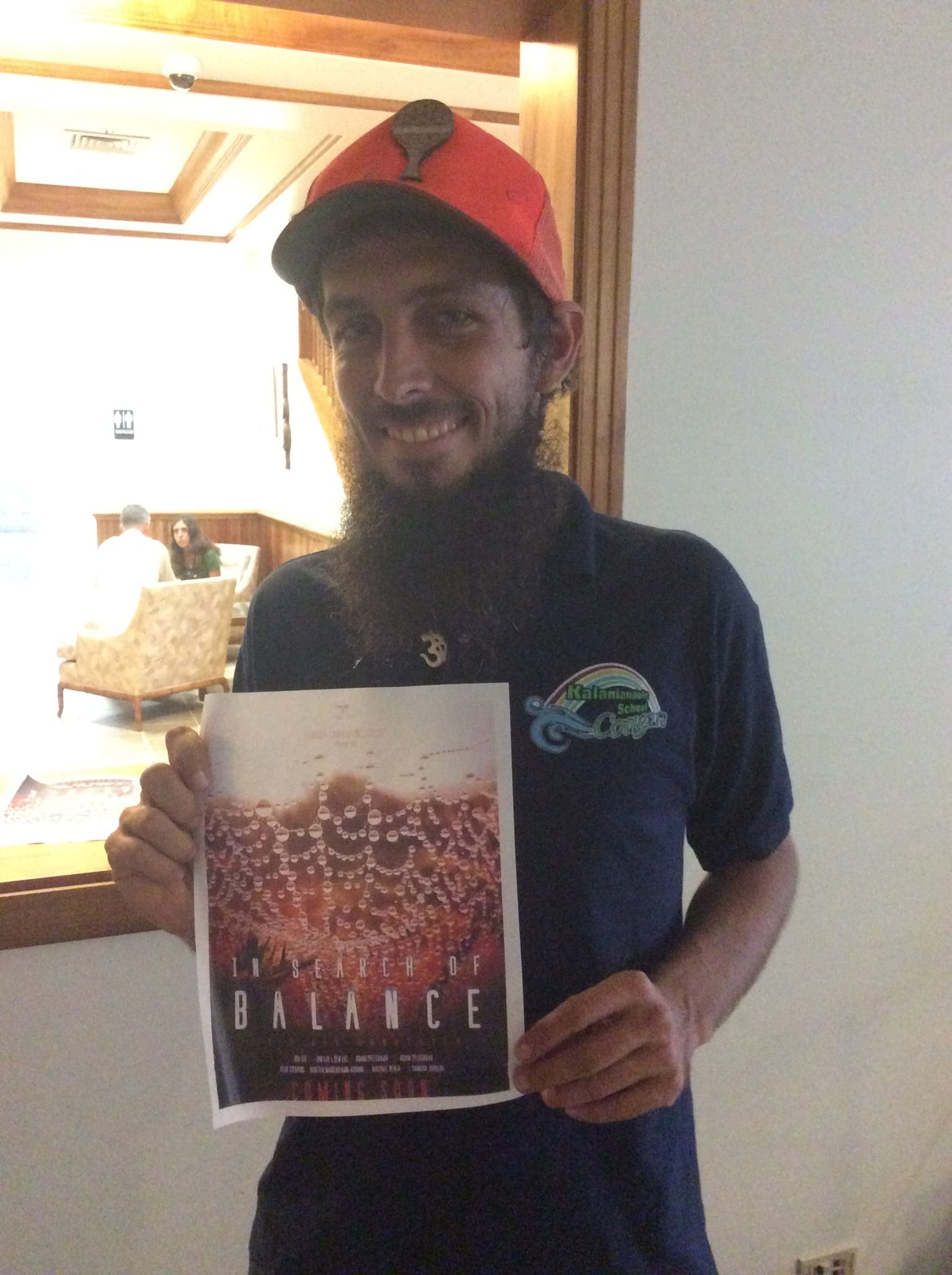 Saturday evening: Drake Weinert with the poster for In Search of Balance.